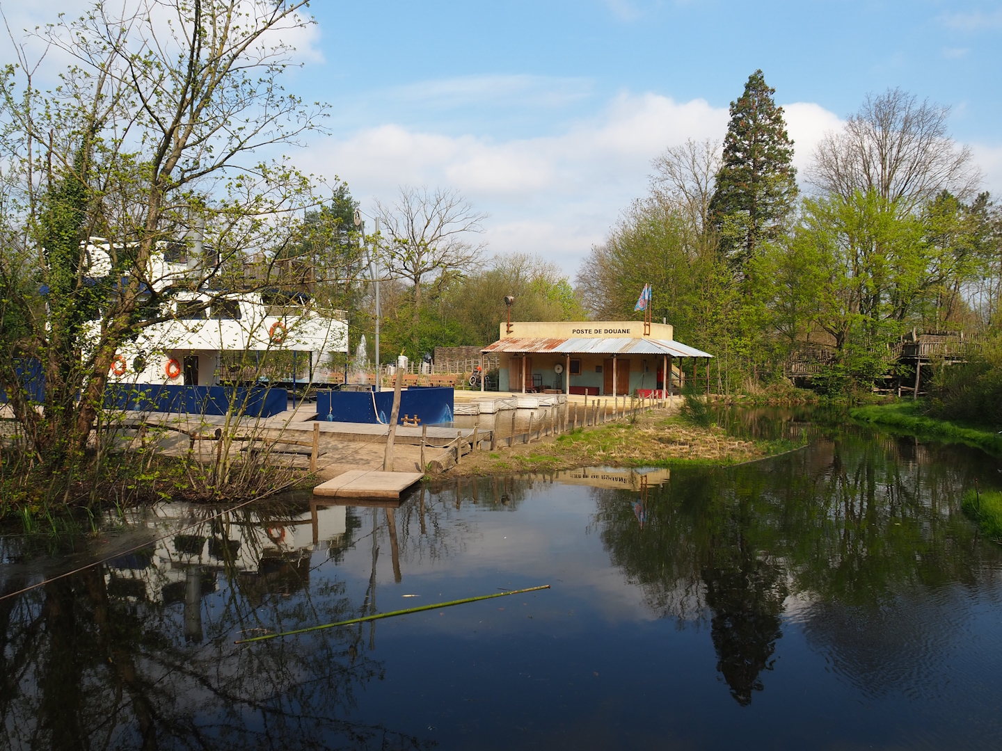 Part of African area playground with ship and harbor theme, customs post sitting and viewing area and bonobo island moat, 2023-04-18