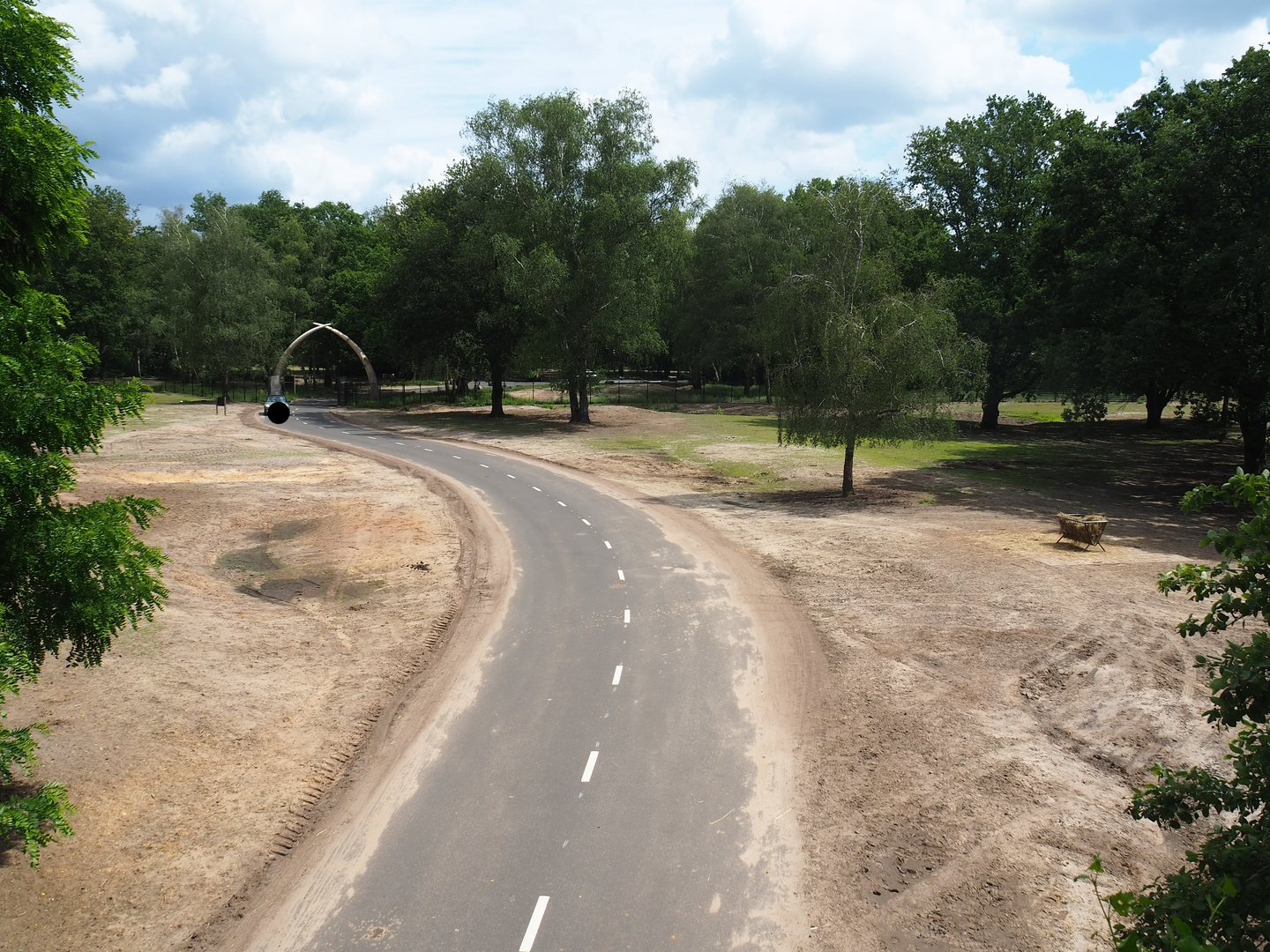 Part of multi-hectare mixed savanna paddock, with beginning of the car safari, 2022-06-12