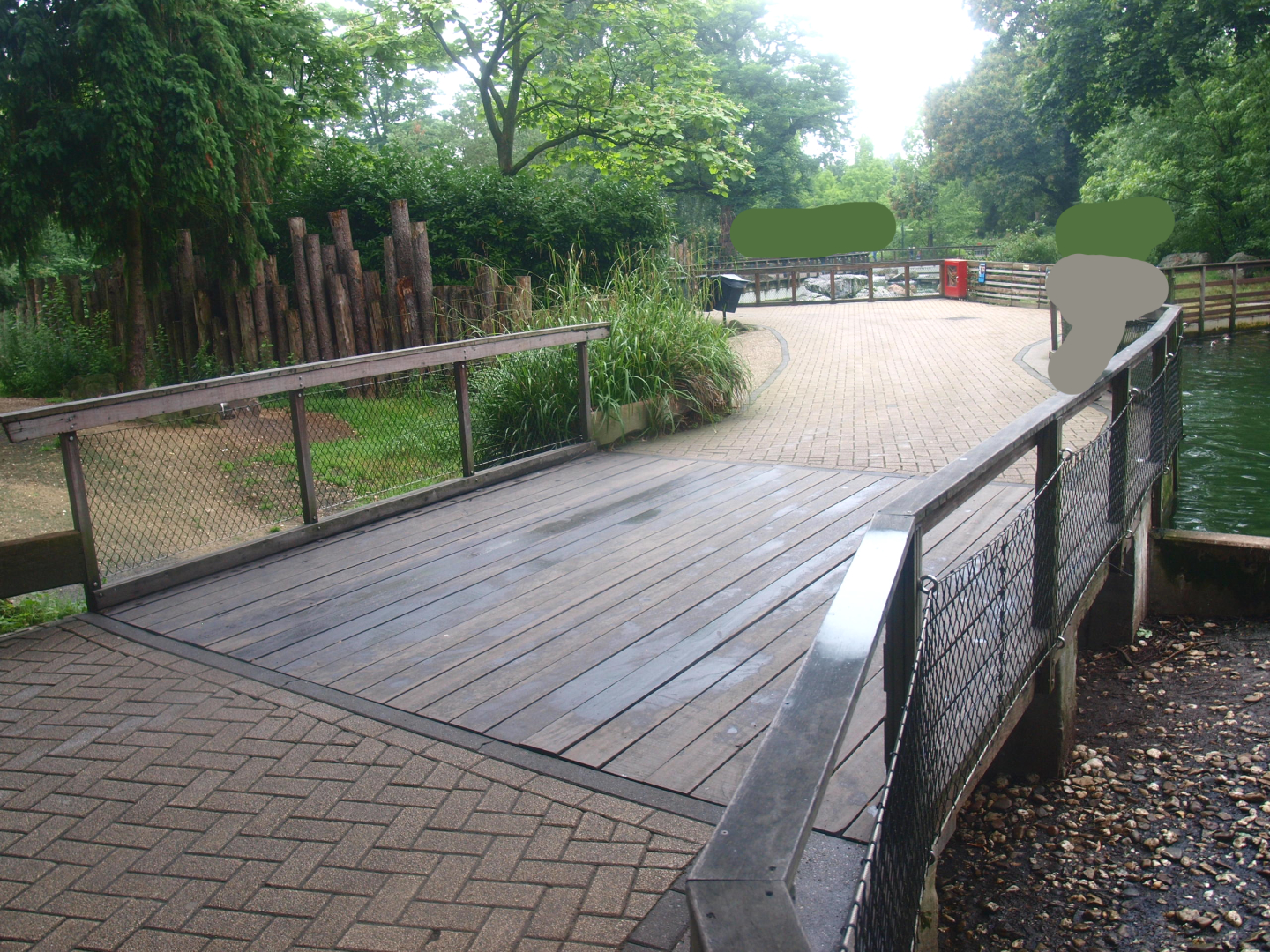 Passage under visitor bridge between land and water parts of the Humboldt penguin exhibit, 2015-07-19
