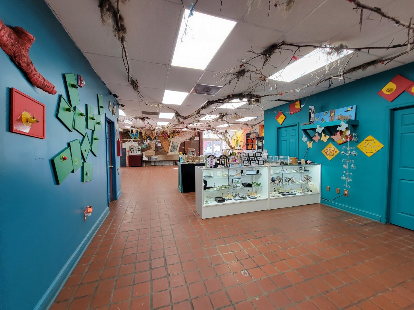 Philly Insectarium - Looking at entrance from gift shop/hall to butterflies