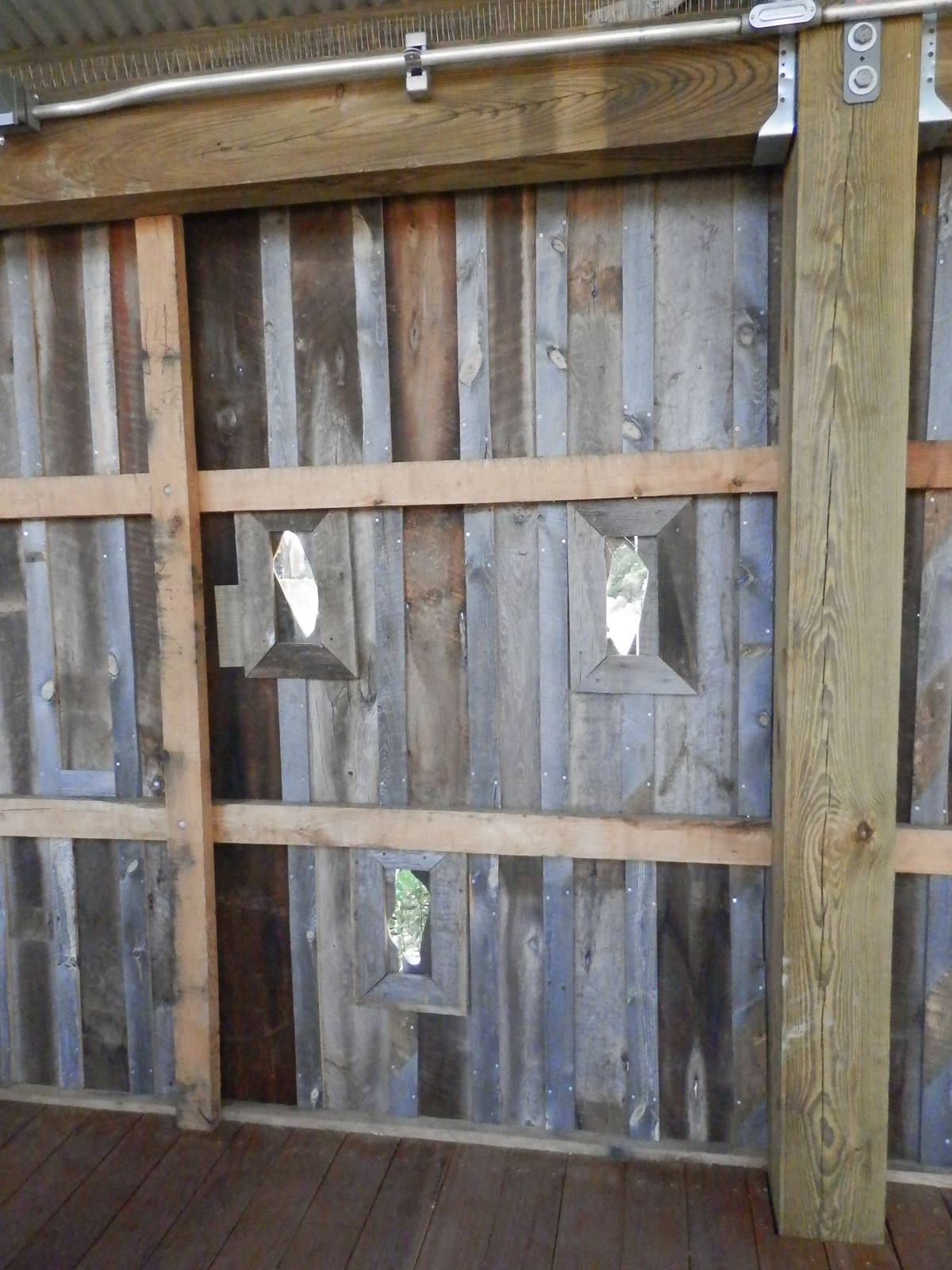 "Portholes" on deck to view hippo pool