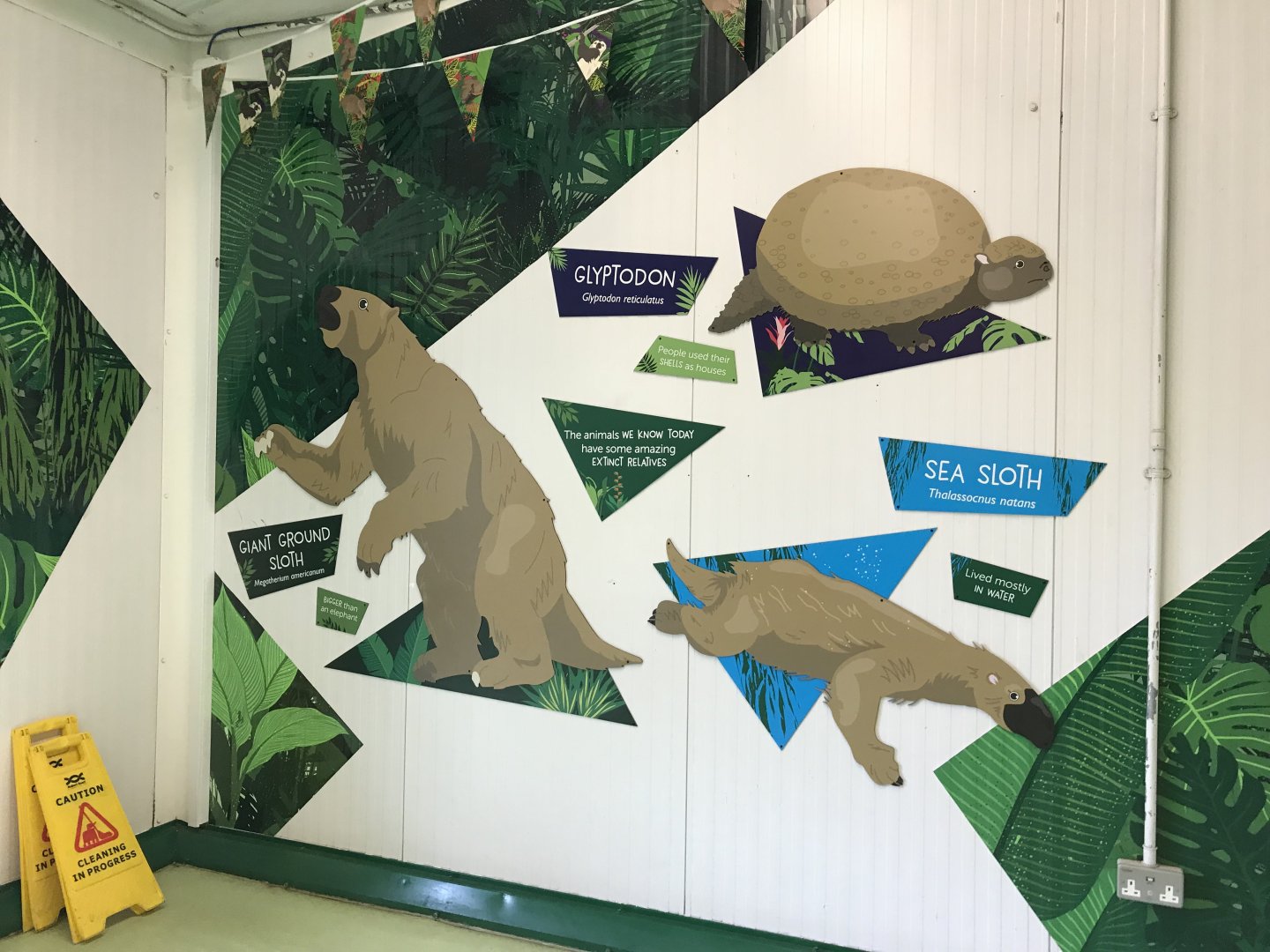 Prehistoric sloth signage