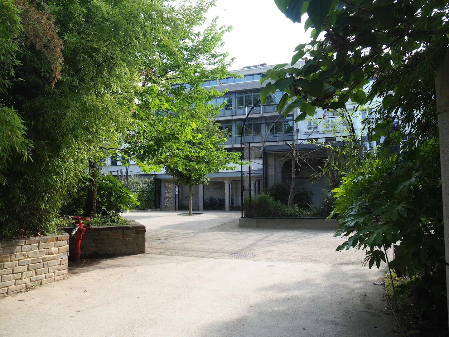 Reconstructed 1850's raptor aviaries, now used for parrots, songbirds, doves and smaller ground birds, 2023-07-22