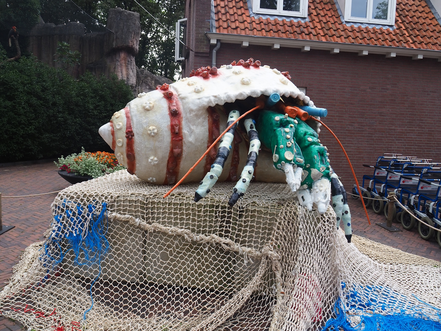 Recycled materials artwork exhibition - Hermit crab made from plastic and fishing nets, 2023-08-17