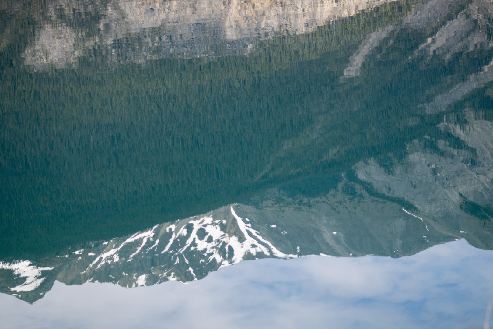 Reflection of the Rockies on Muncho Lake, British Columbia