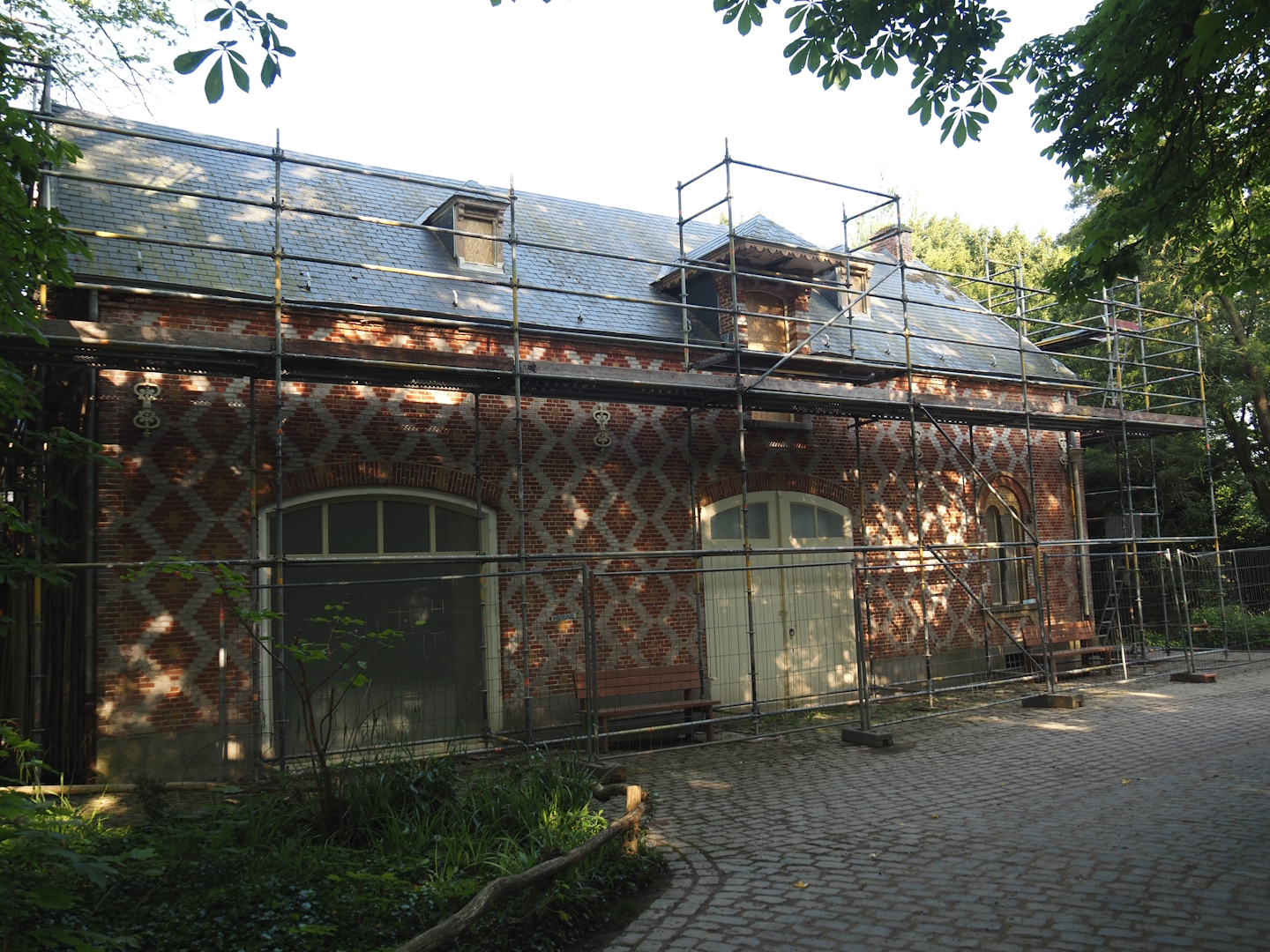 Renovation of late 19th century stable and carriage house building, now off-show animal building, 2024-05-10