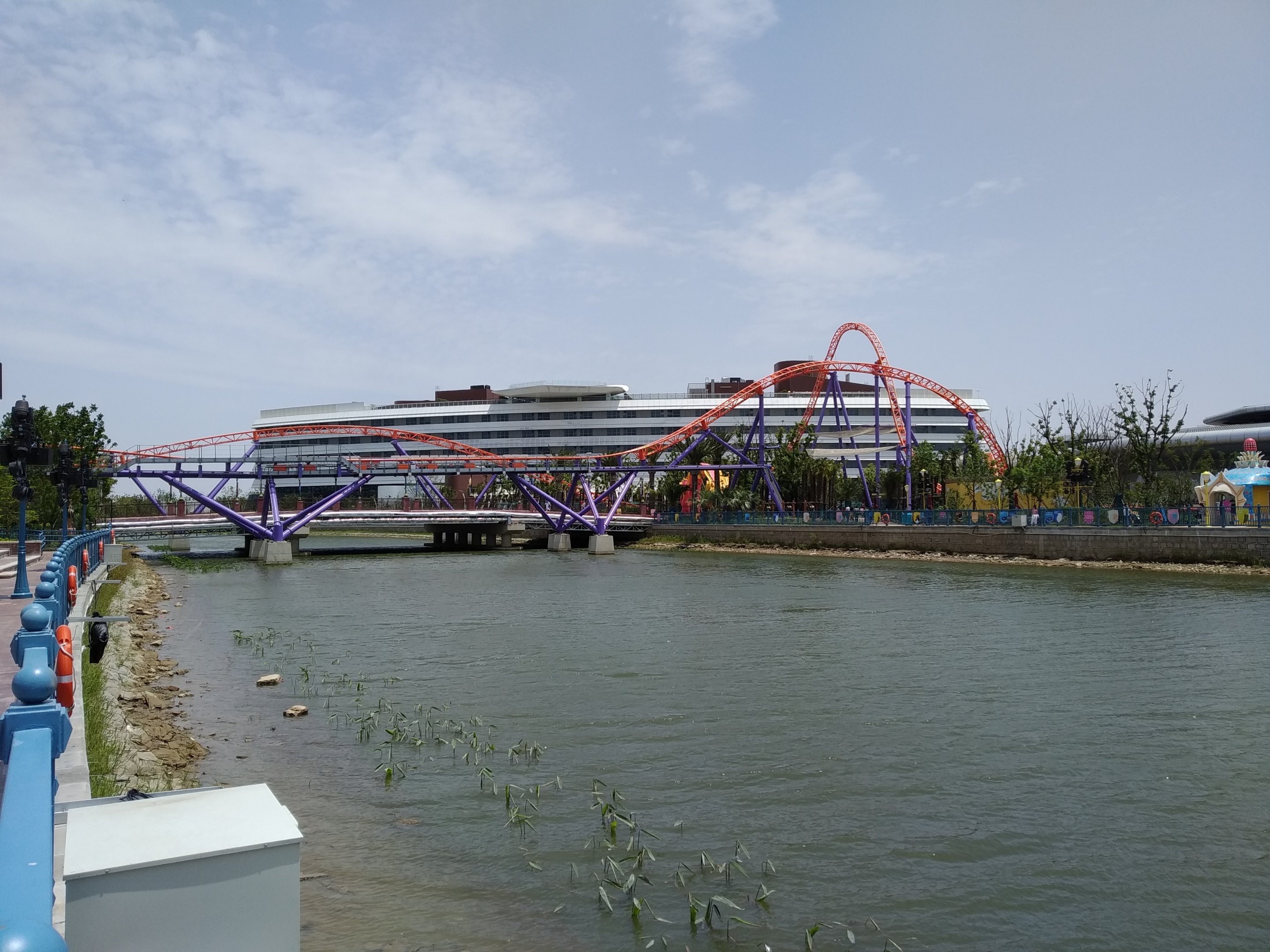 Roller Coaster Crossing The Canal