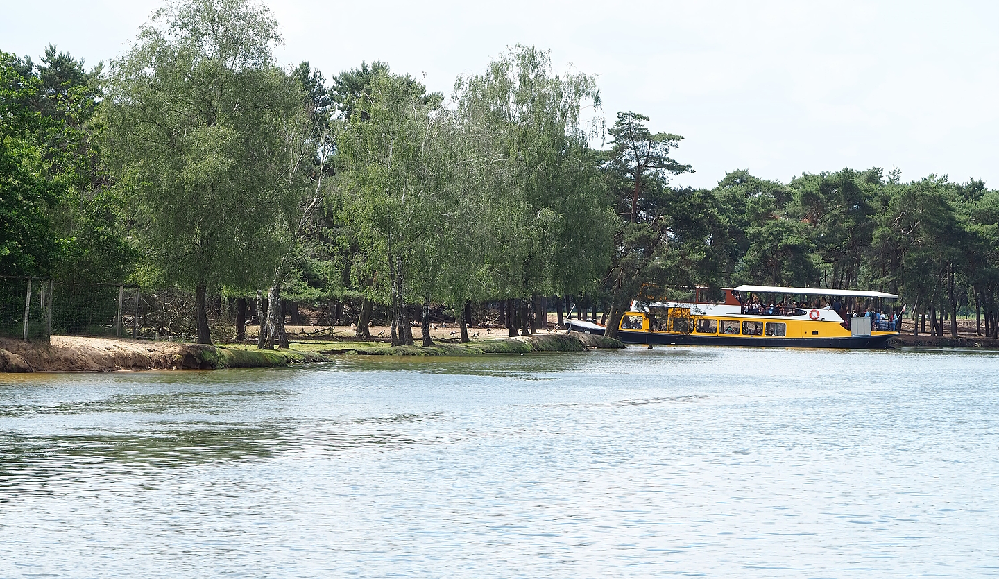 Safari boat canal edge of the multi-hectare mixed savanna and Safari boat, 2022-06-12