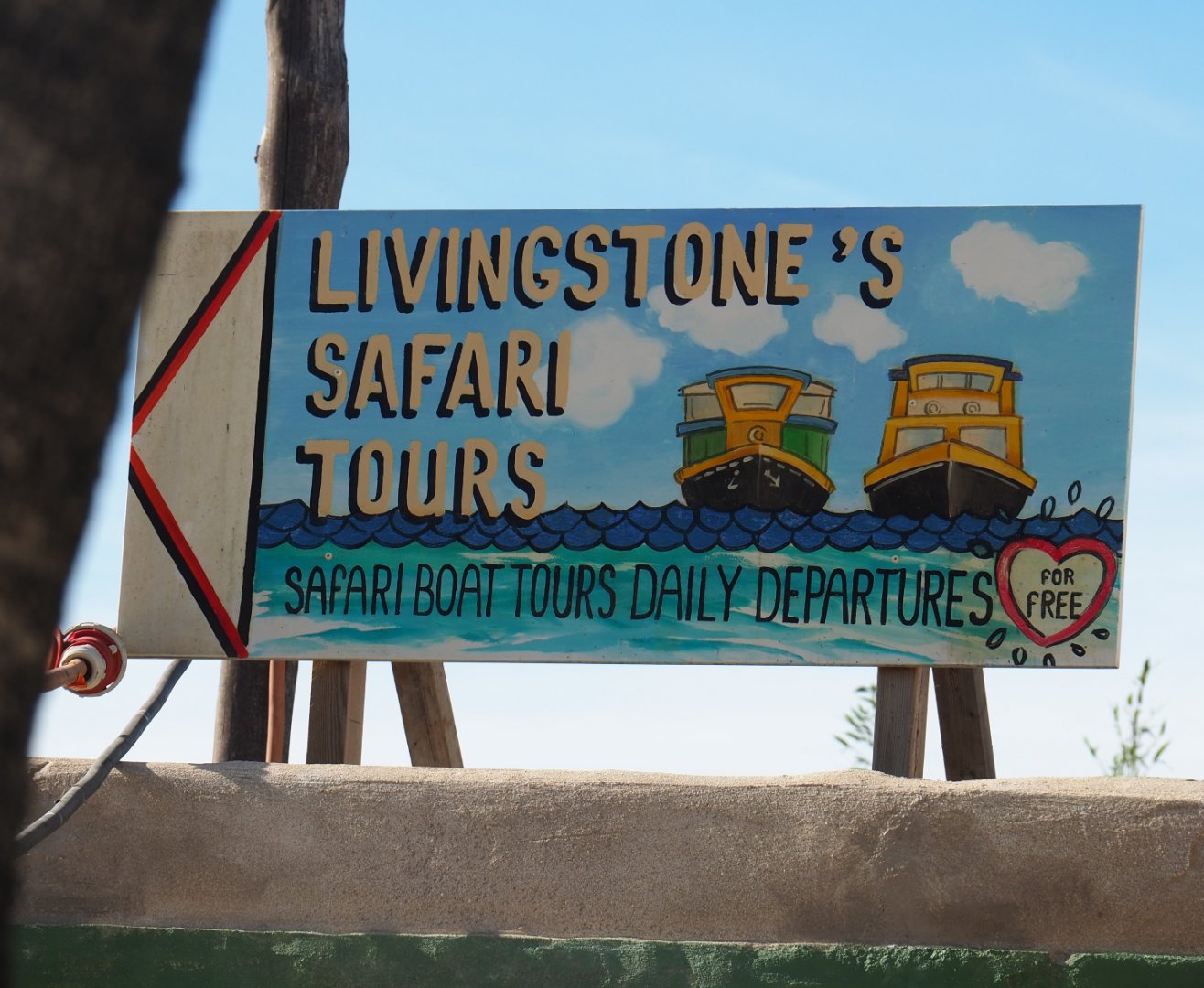 Safari boat tours sign, 2019-09-15