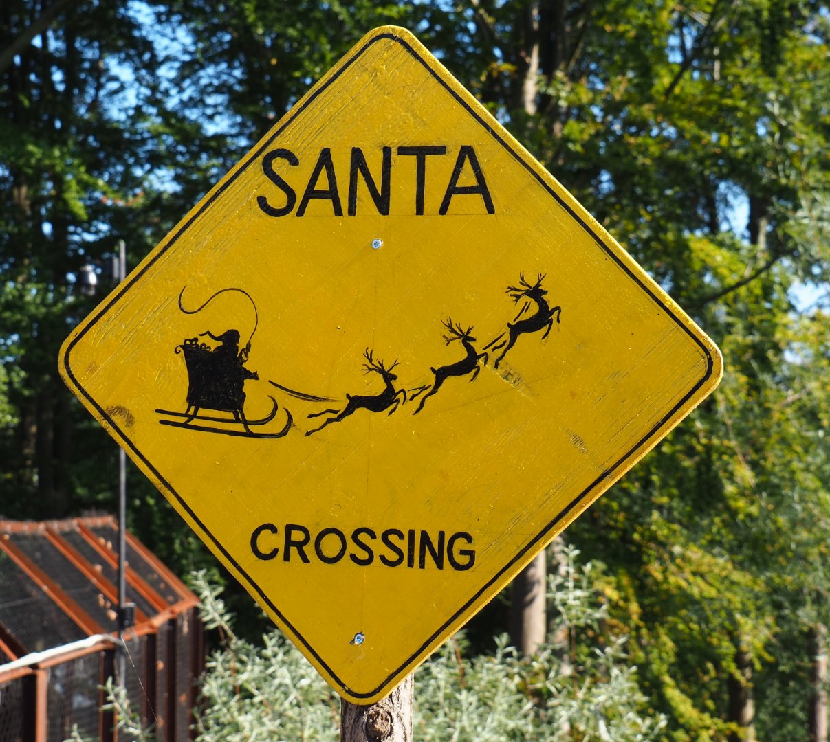 Santa Crossing sign next to reindeer paddock, 2020-09-02