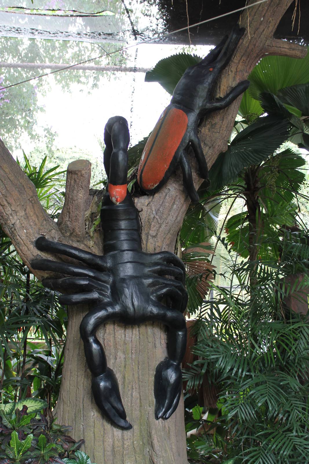 scorpion and beetle statues