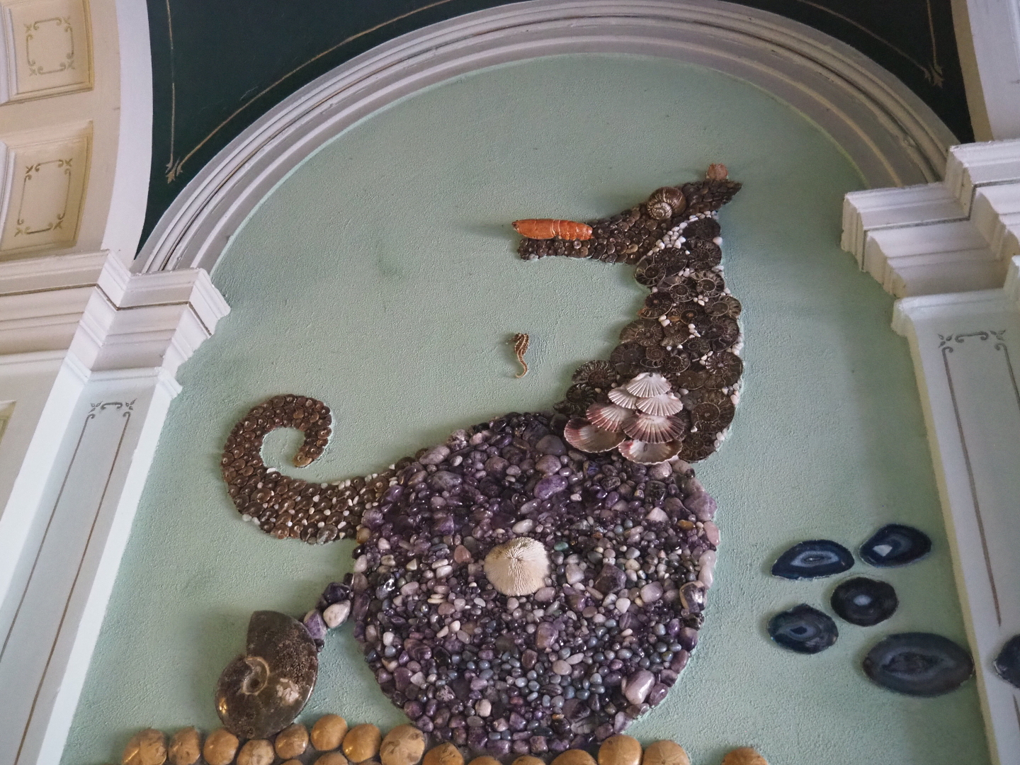 Seahorse artwork in the corridor near the aquarium building restrooms, 2021-09-03