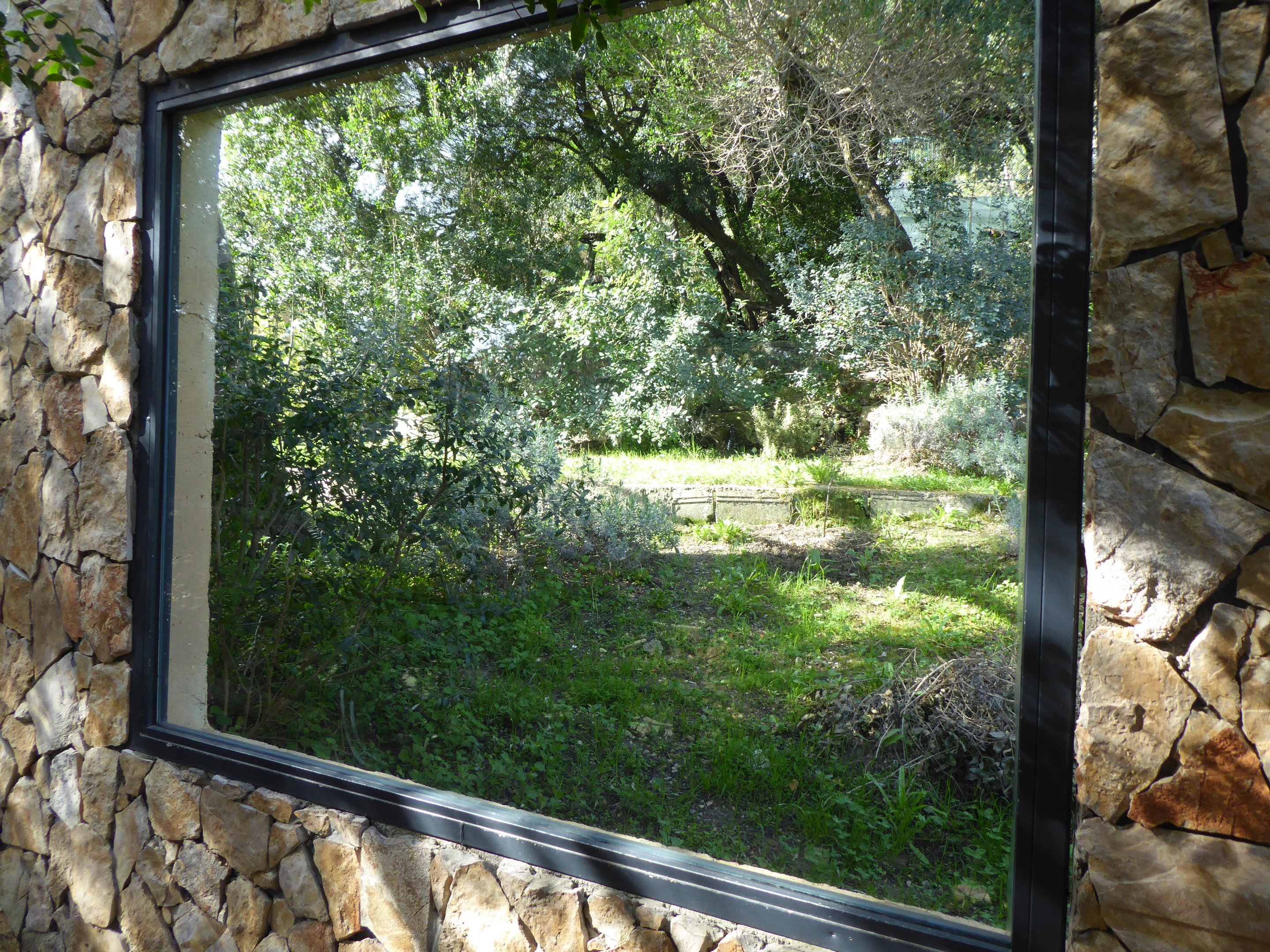 Second viewing window into the exhibit for Iberian Lynx (Lynx pardinus) within the "Tapada do Lince-ibérico" complex