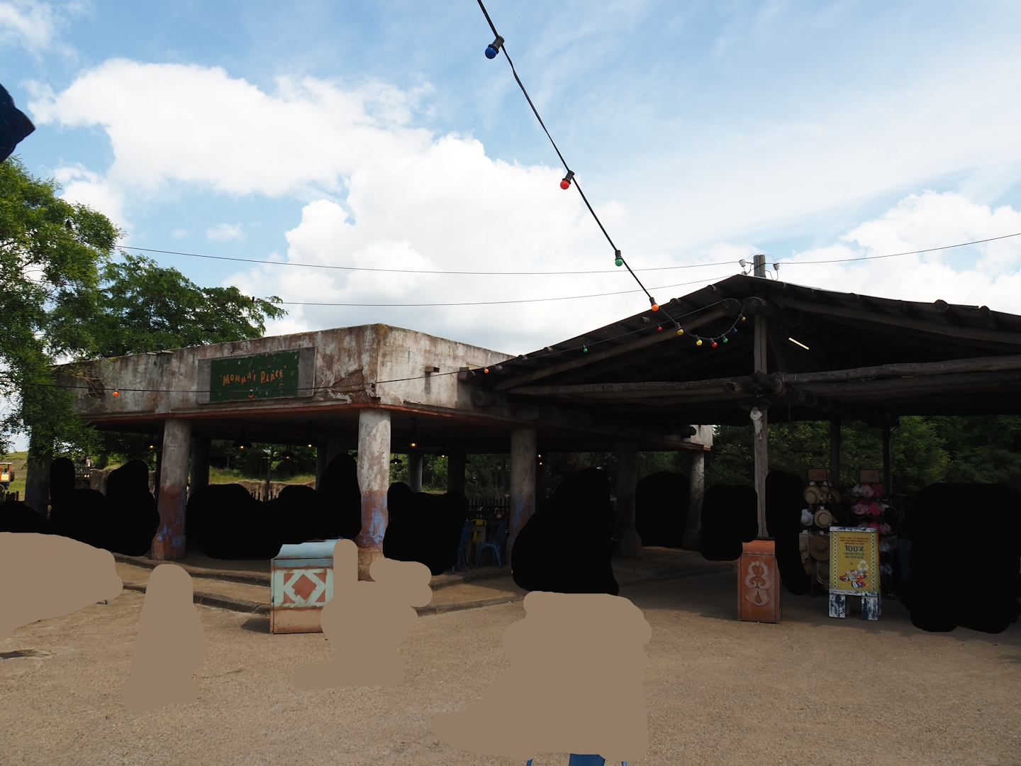 Serenga - Covered walkway outside gift shop and covered eating area, 2024-06-23