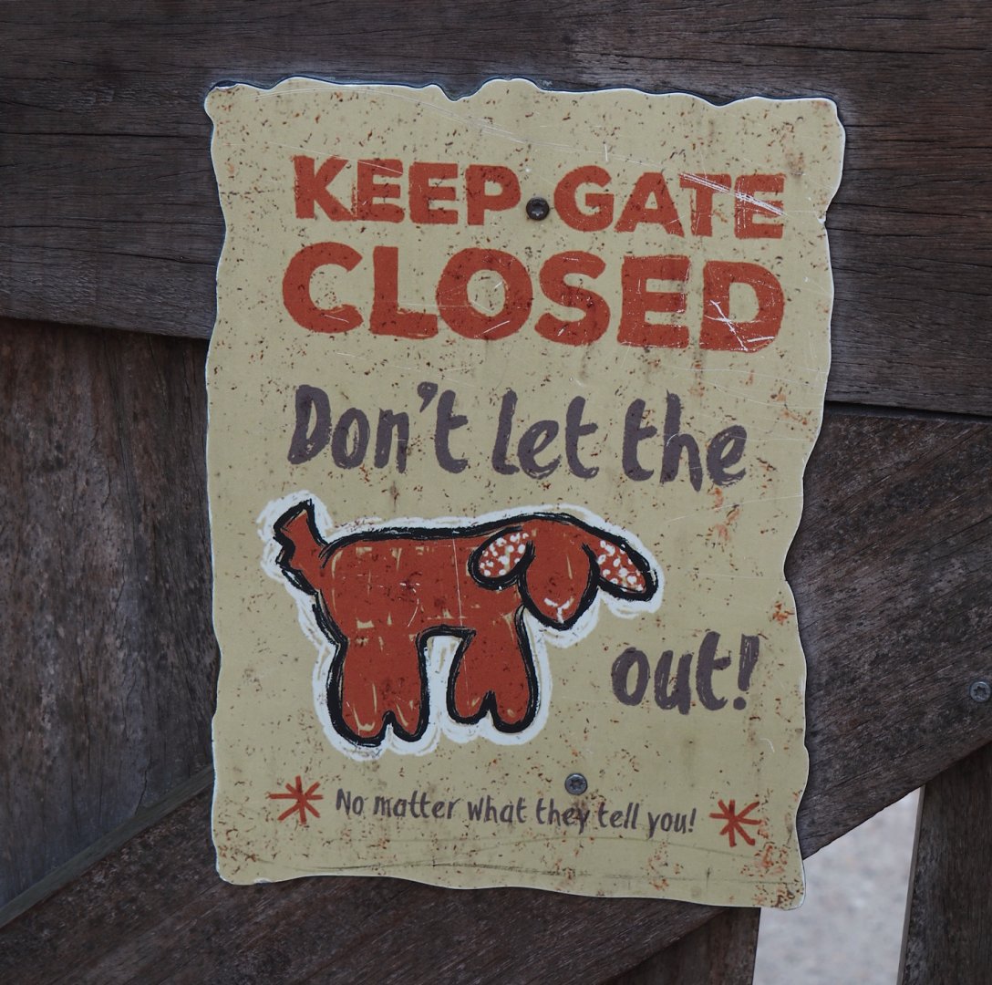Serenga - Dogon village - Don't let the goat out sign on petting zoo paddock, 2024-06-23