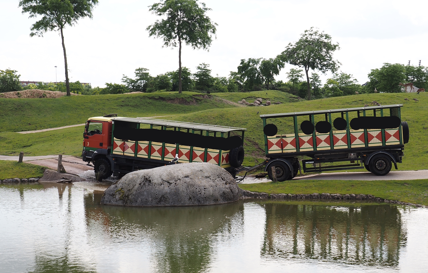 Serenga - Safari truck driving through savanna exhibit, 2024-06-23