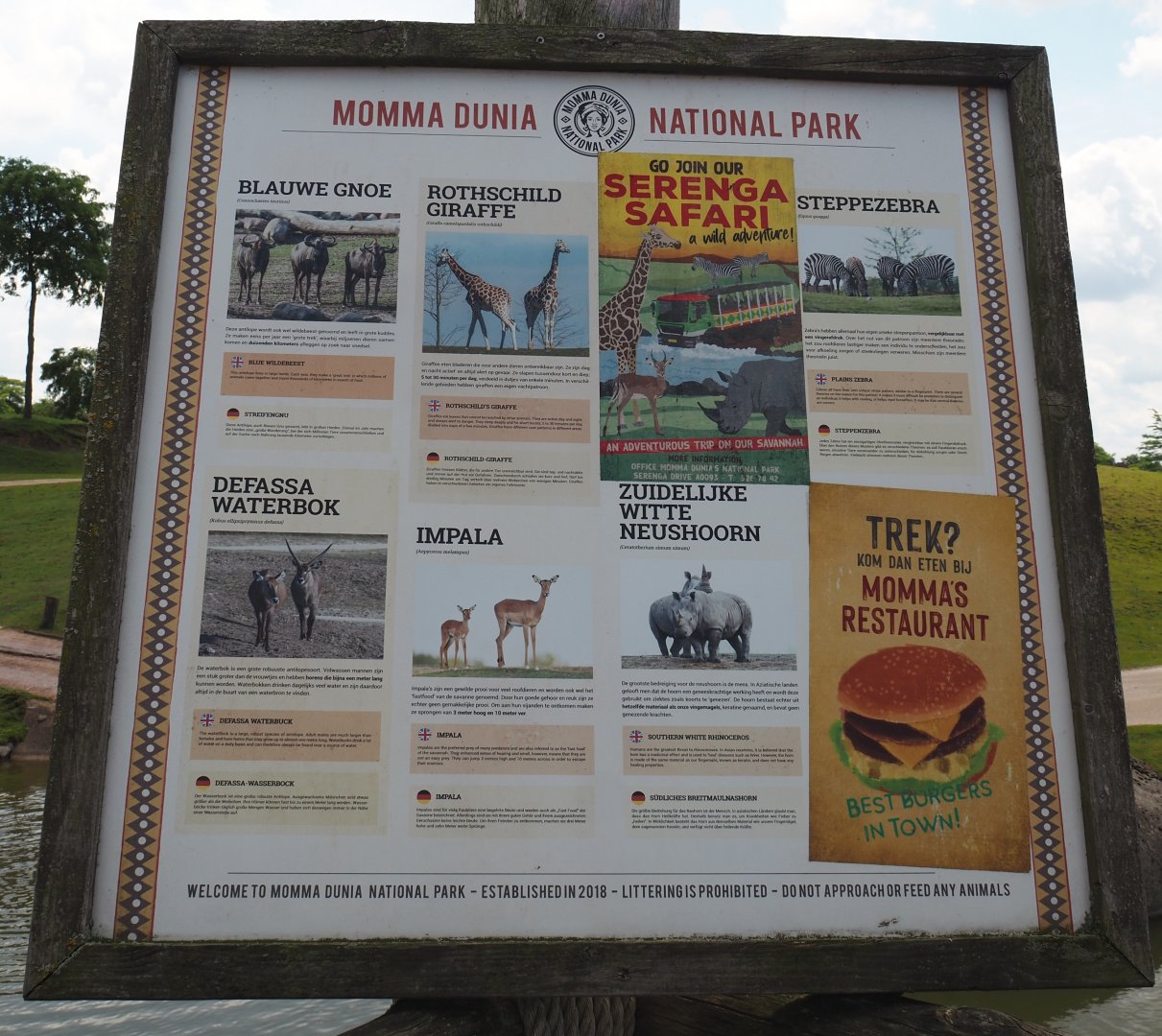Serenga - Savanna exhibit species signage and ads for restaurant and safari truck tour, 2024-06-23