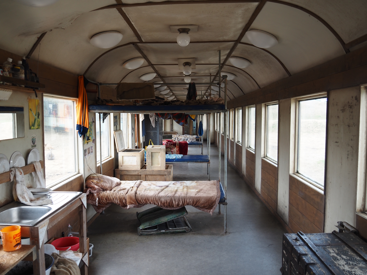 Serenga - View inside derailed train viewing area with poachers' hide-out theming, 2024-06-23