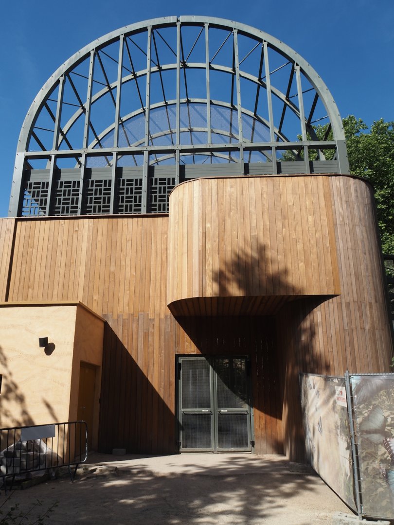 Side of the hippo house aviary with accesses to lower and upper viewing areas, 2025-05-14