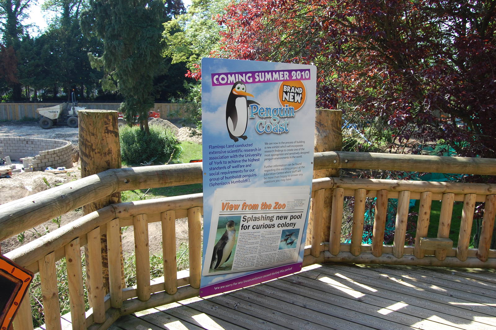Sign advertising new penguin exhibit