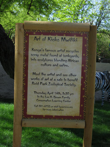 sign explaining metal animals