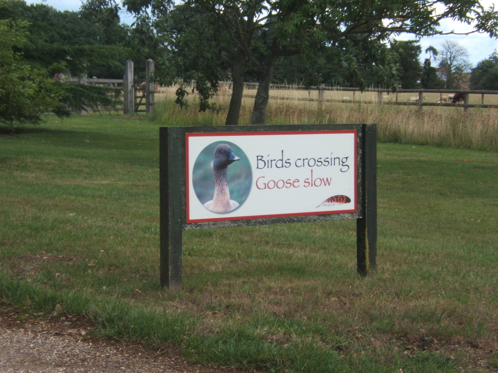 Sign on drive way to the car park