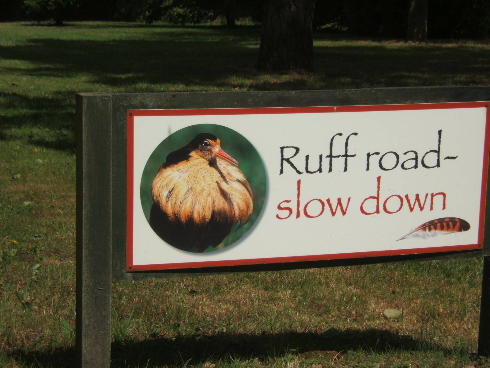 Sign on drive way to the car park