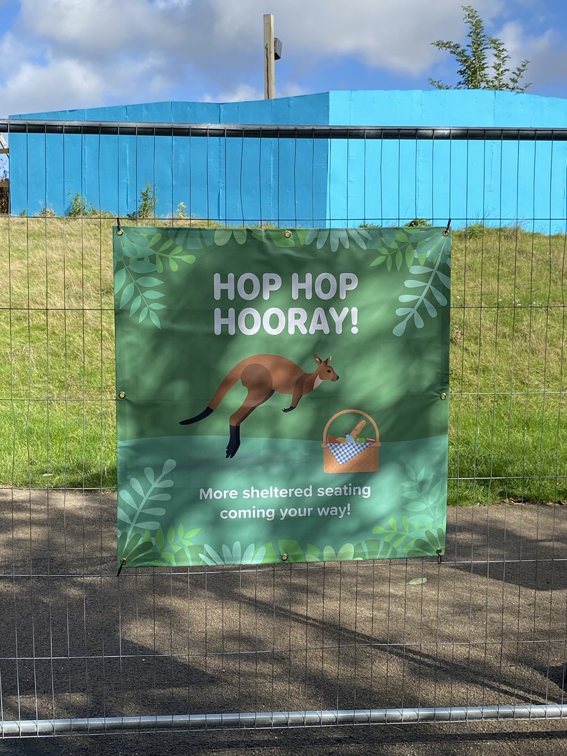 Signage about new seating area in old Sealion area, ZSL Whipsnade, UK