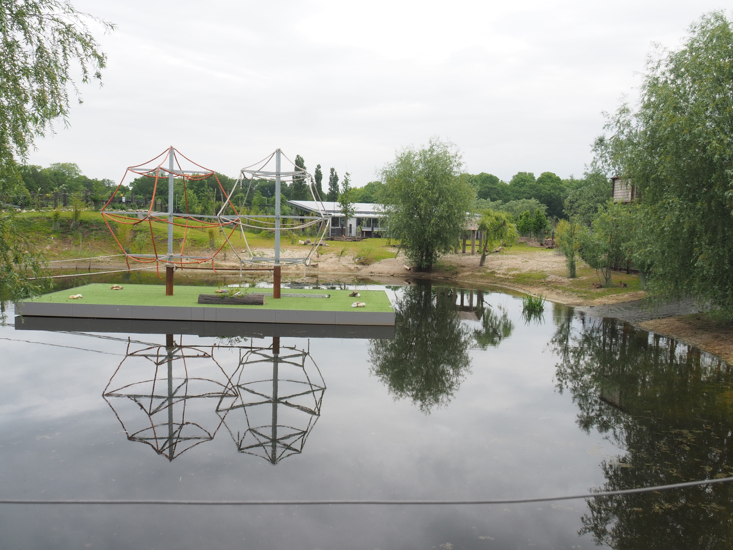 South American exhibit with South American house in background and new floating islands for future spider monkey exhibit, 2022-05-17