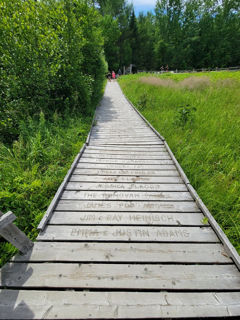 Squam Lakes NSC, 7/22 - Boardwalk with sponsor names on wood