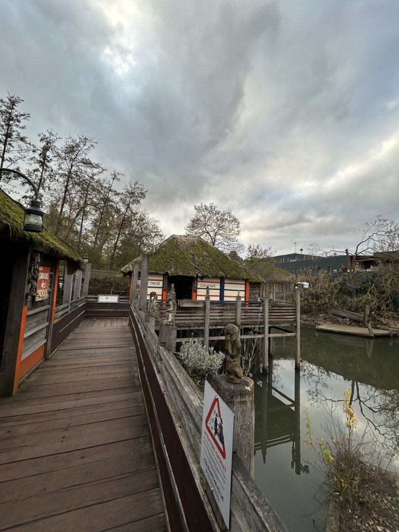 Stilt village with pygmy hippopotamus enclosure