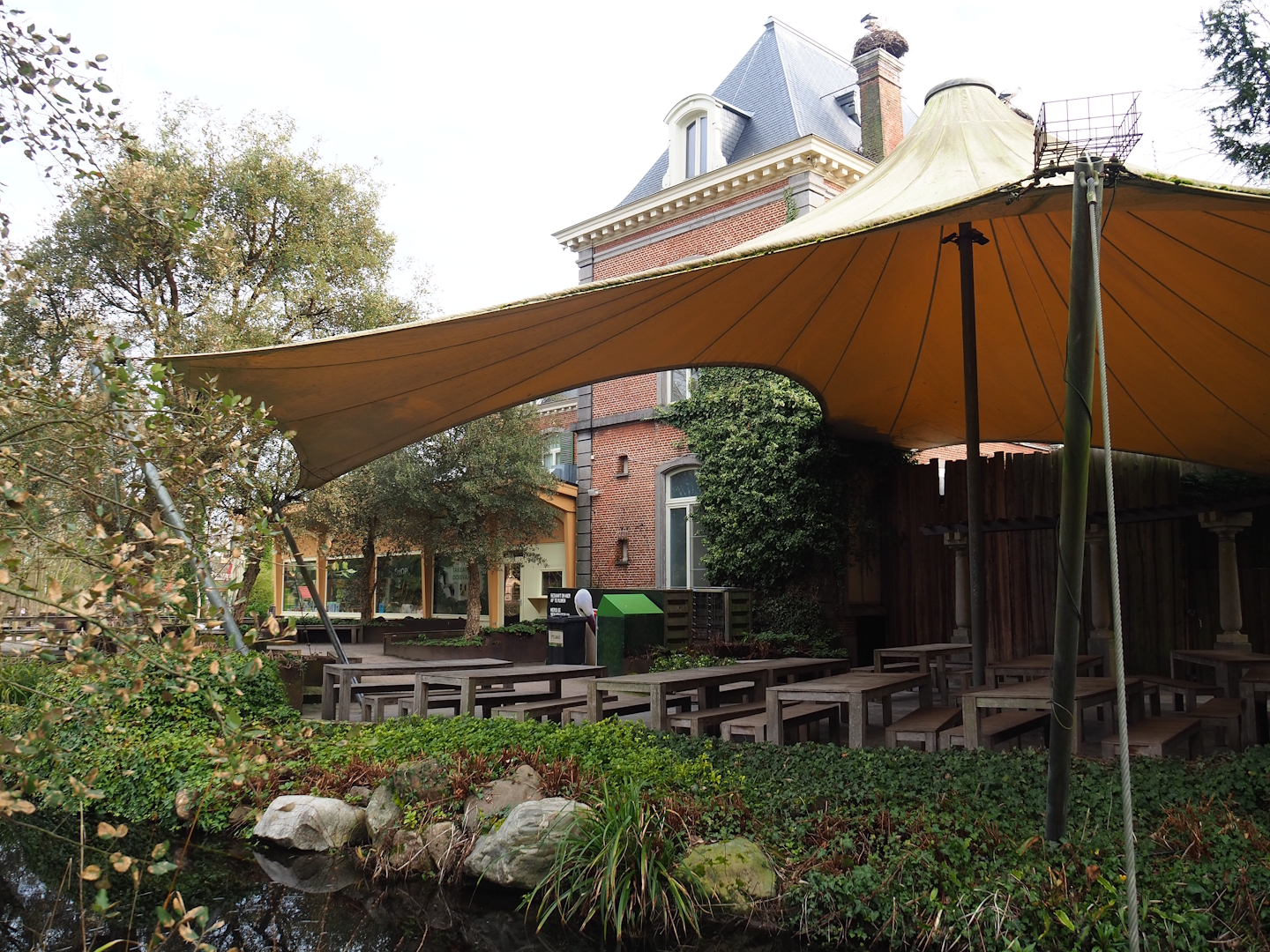 Terrace area and 1780 manor house, normally a restaurant but currently used as ticket office and gift shop building, 2024-03-04