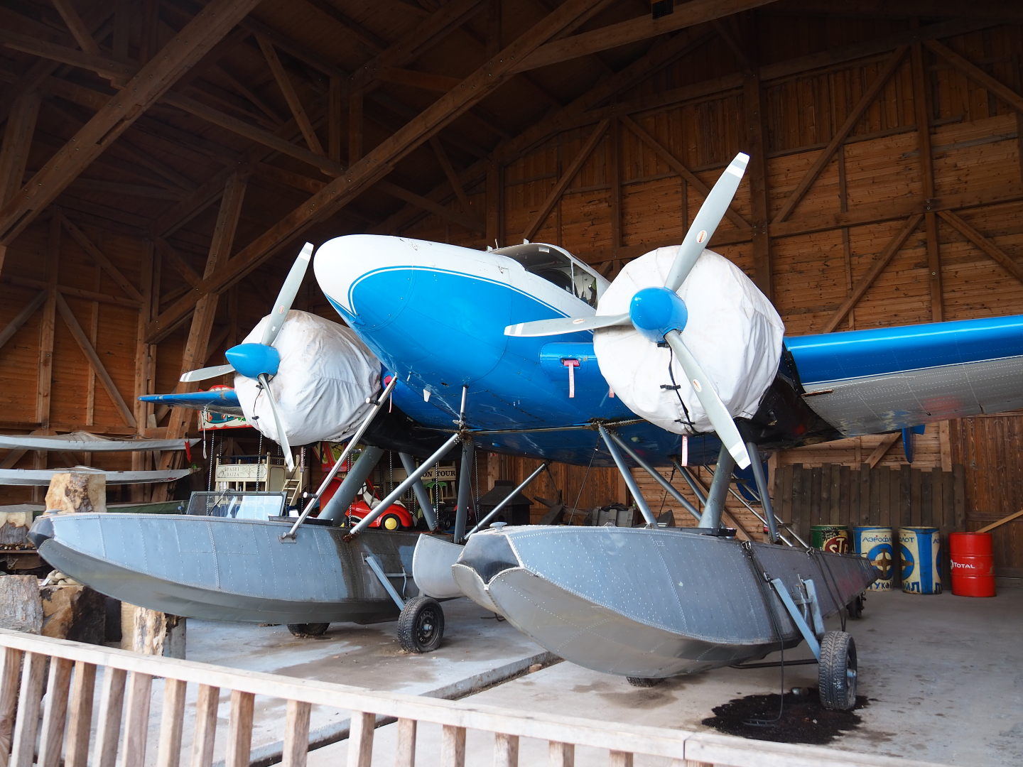 The Land of the Cold theming - Bush plane with floaters in the Golden Eagle Aviation hangar, 2019-10-04