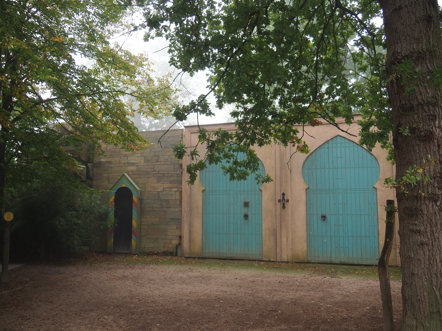 Themed wall and gates in front of Asian elephant training wall, 2021-10-10