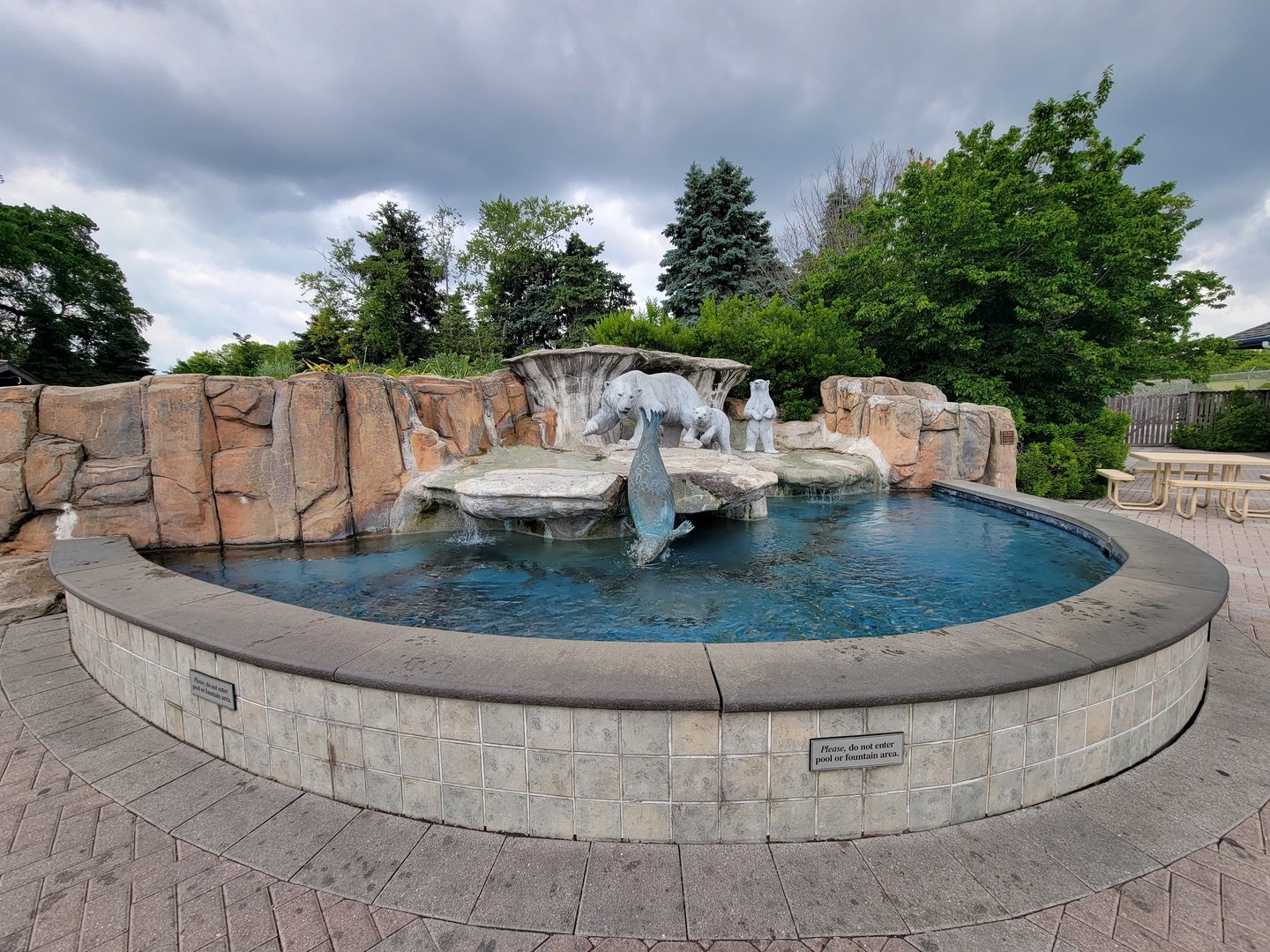 Toledo Zoo - Polar bear and seal statue in Blade Plaza