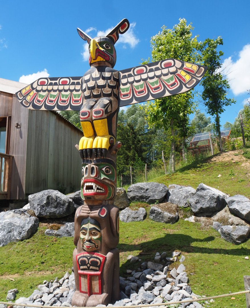 Totem pole theming in Native Village/Fallow deer walk-through area of The Last Frontier, 2022-06-28