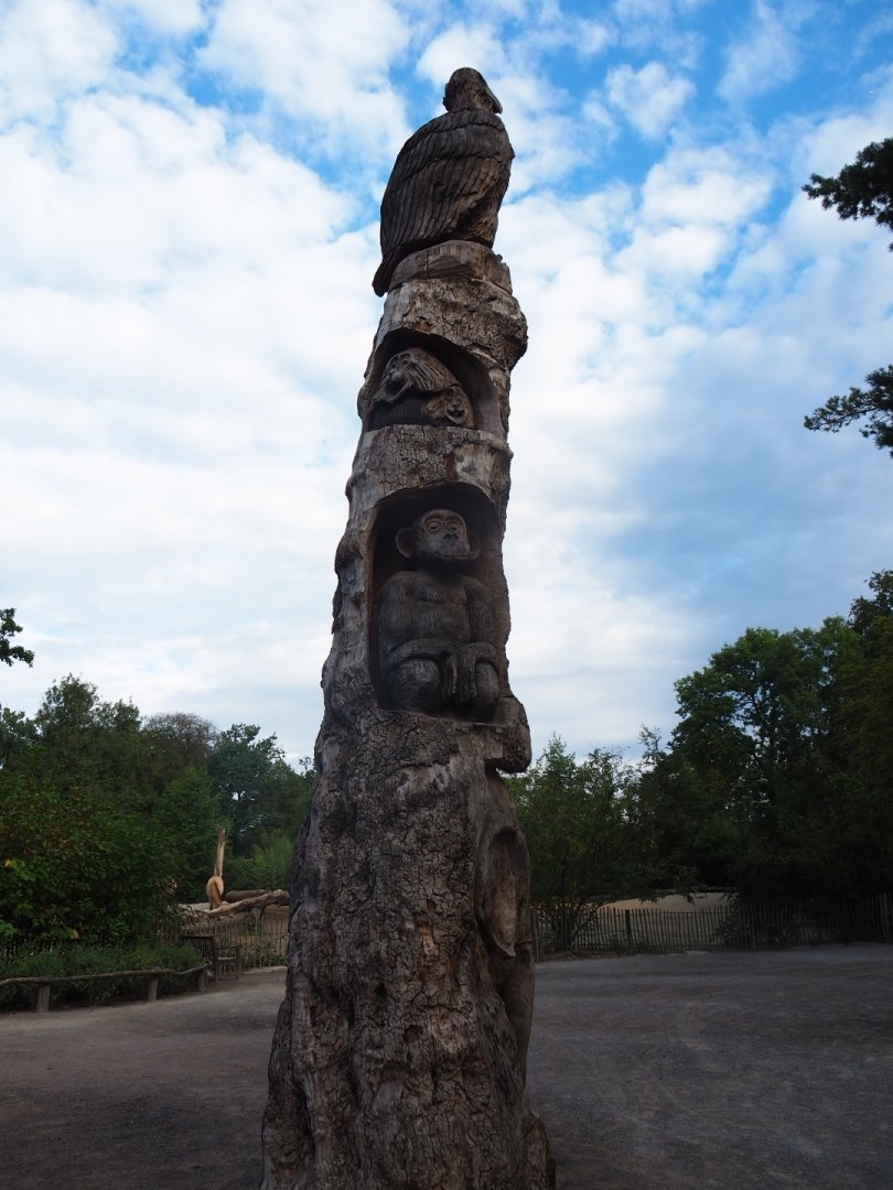 Totem pole with animal carvings
