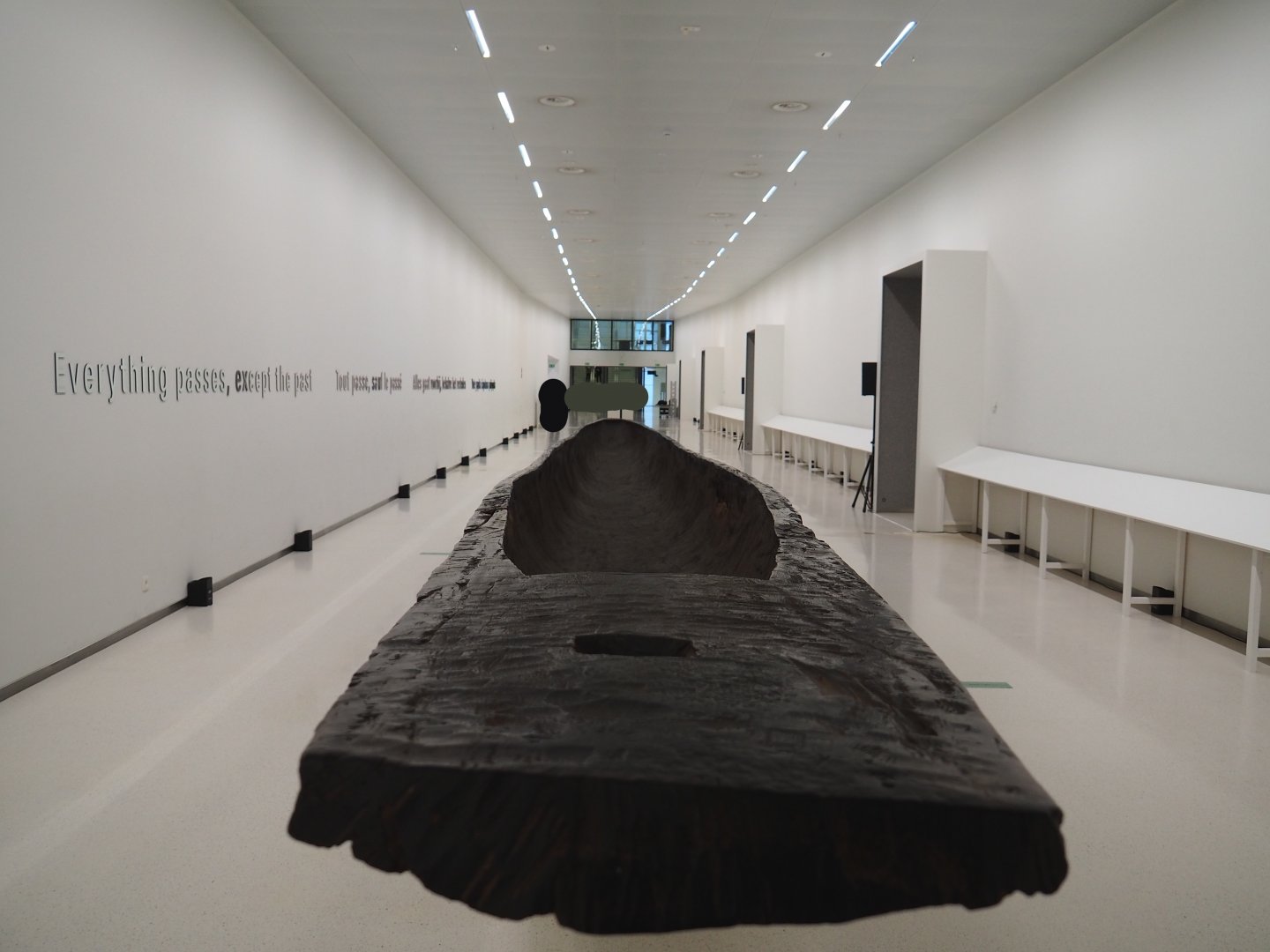 Underground corridor between the entrance building and the museum building, with long dug-out canoe, 2021-10-20