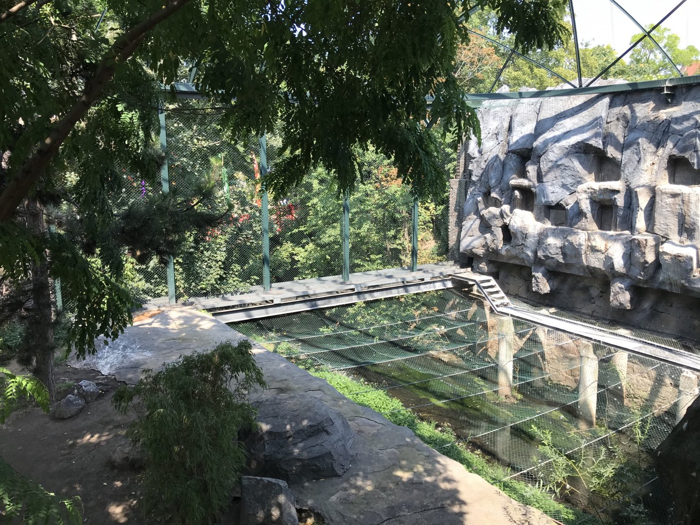 Unusual aviary floor over River Parthe passing through the zoo