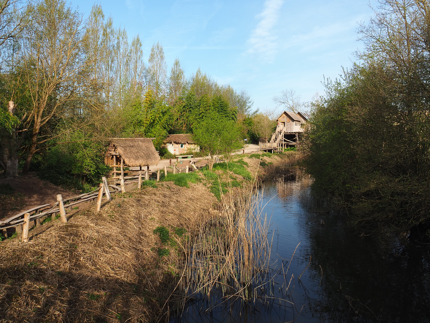 View in Asian area with Barebeek creek, adventure routes, walkways, theming structures and second Asian elephant viewing lodge, 2022-04-12
