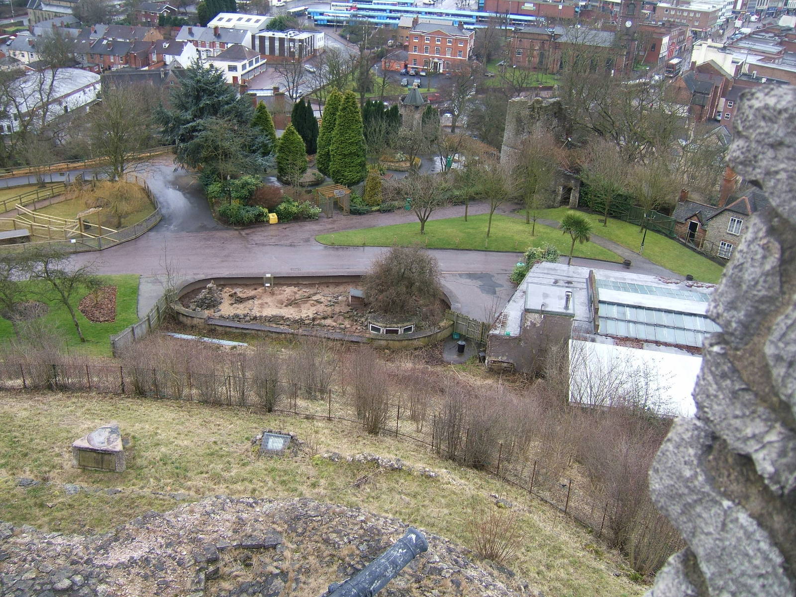 View of the meerkat enclosure, reptile house and sensory garden from the to