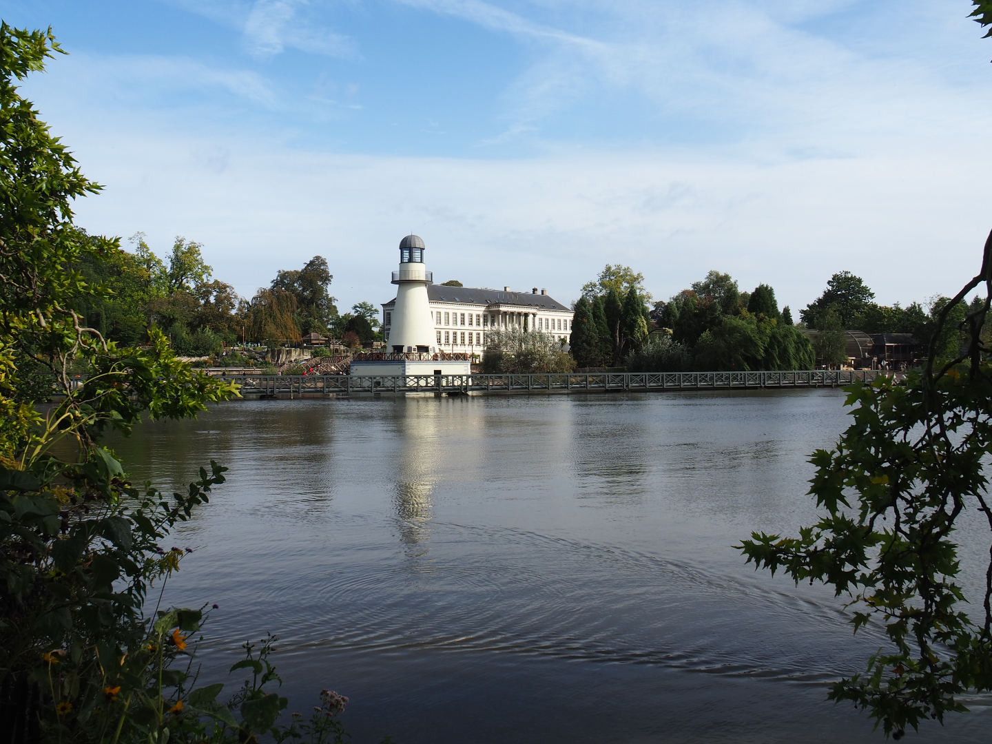 View over one of the lakes with aquarium building and penguin/seal exhibit lighthouse, 2019-10-04