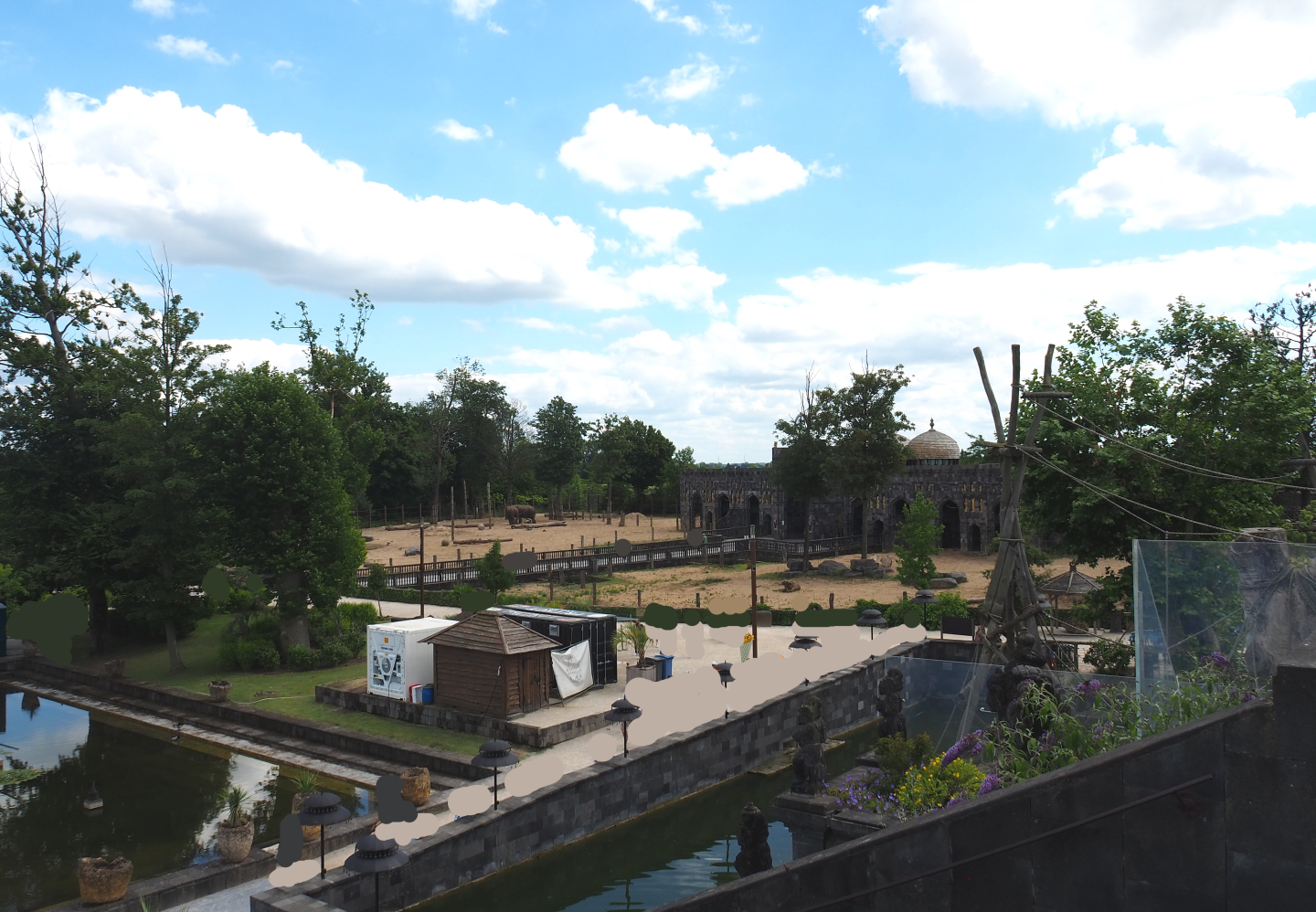 View towards the Asian elephant exhibits from the top of the Flower Temple, 2022-06-28