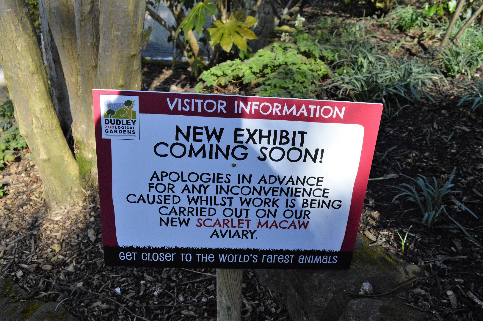 Visitor information sign next to new aviary
