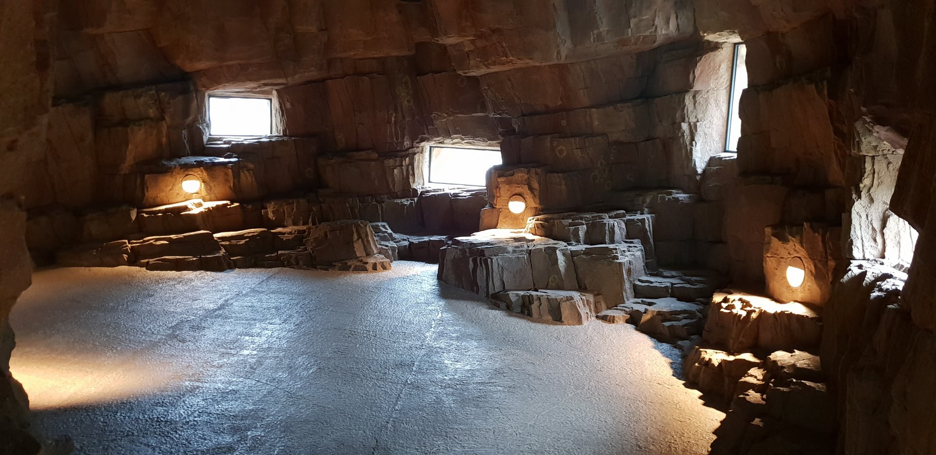 Visitor-pathway with viewing-windows into Gelada-outdoor-enclosure