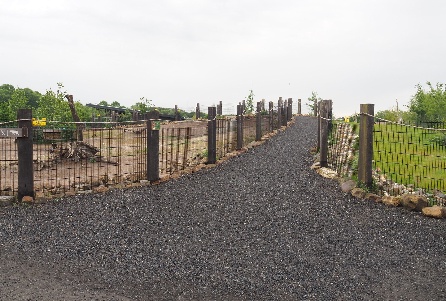 Walkway across dirt berm between two parts of the South American exhibit, 2022-05-17