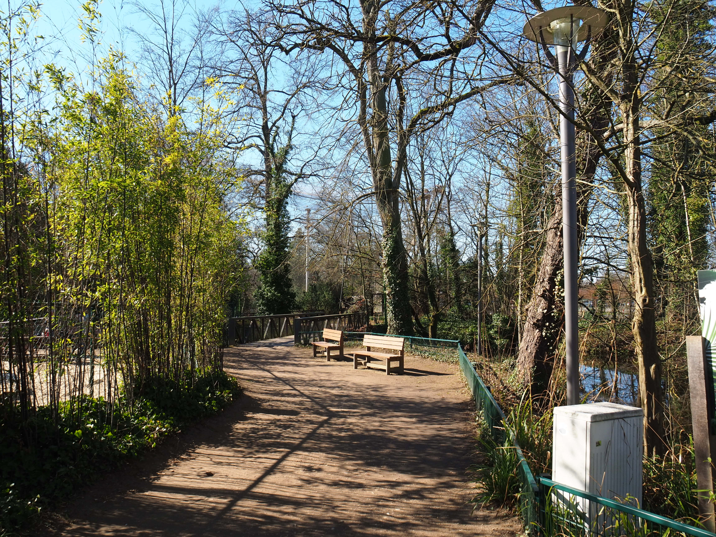 Walkway and bridge from parking lot to vulture aviary and entrance, 2022-03-08