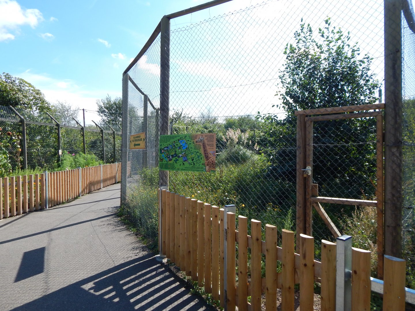 Walkway between Arctic wolf and Chilean flamingo exhibits 030924