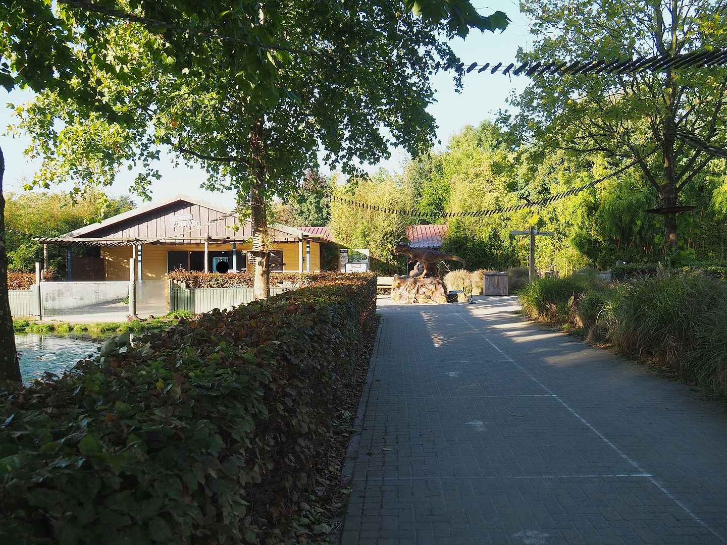 Walkway to entrance with red panda climbing structures, 2022-10-09