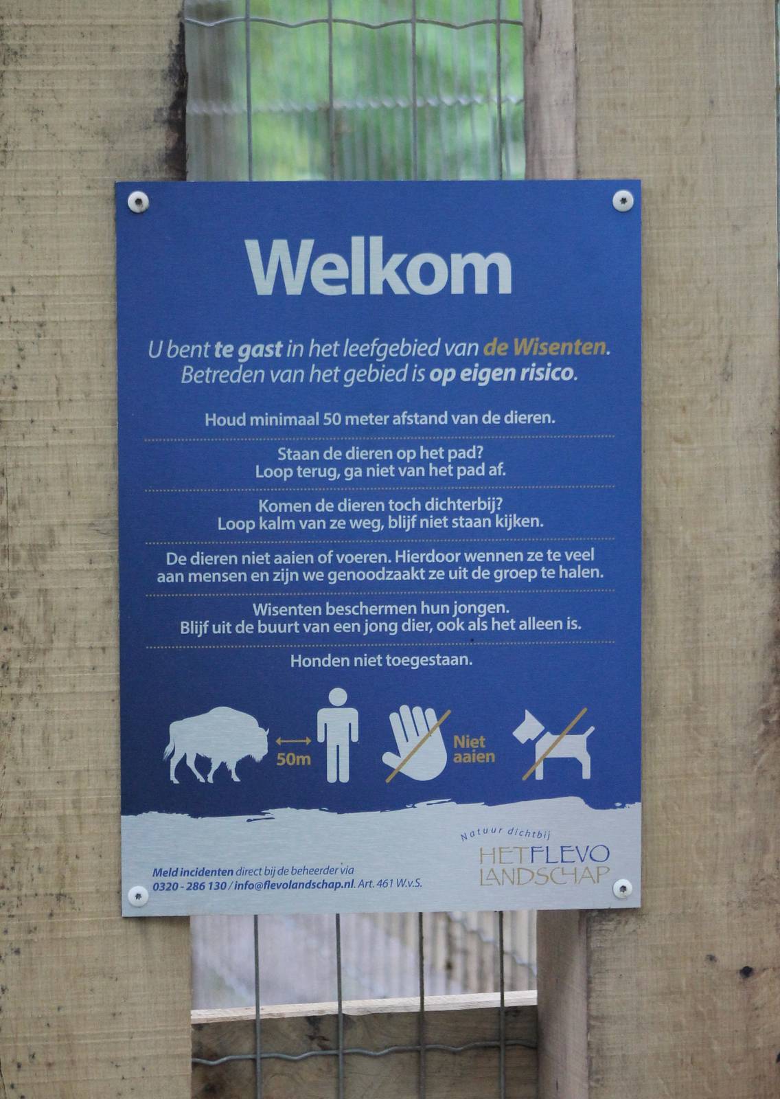 Warning and rule sign Przewalski horse - Wisent enclosure
